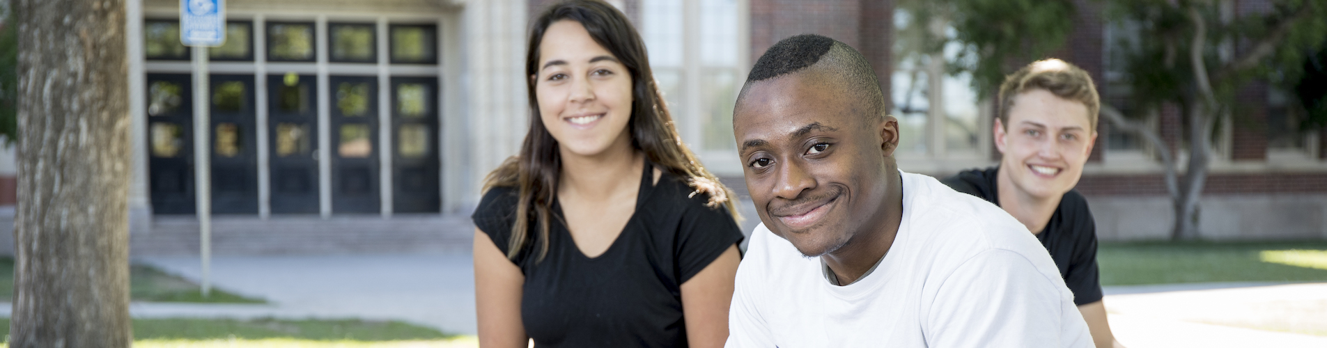 3 students sitting together